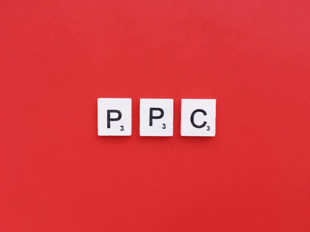 PPC scrabble letters word on a red background